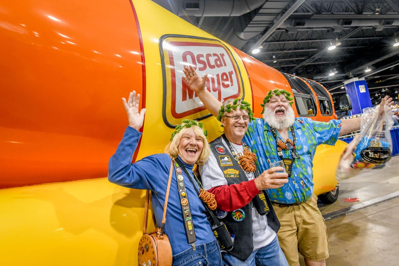 Image of people in front of the Oscar Mayer car at the Great American Beer Festival in Denver, Colorado