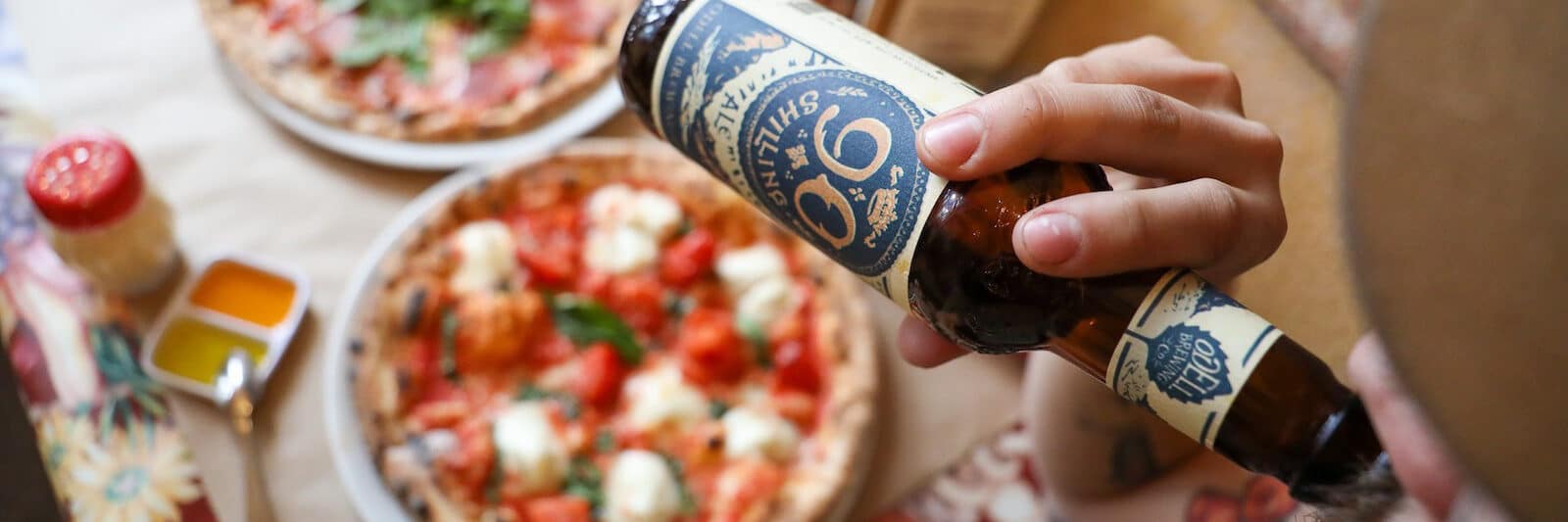 Image of beer and pizza at the Pizzeria Rustica in Colorado Springs, CO
