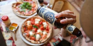 Image of beer and pizza at the Pizzeria Rustica in Colorado Springs, CO