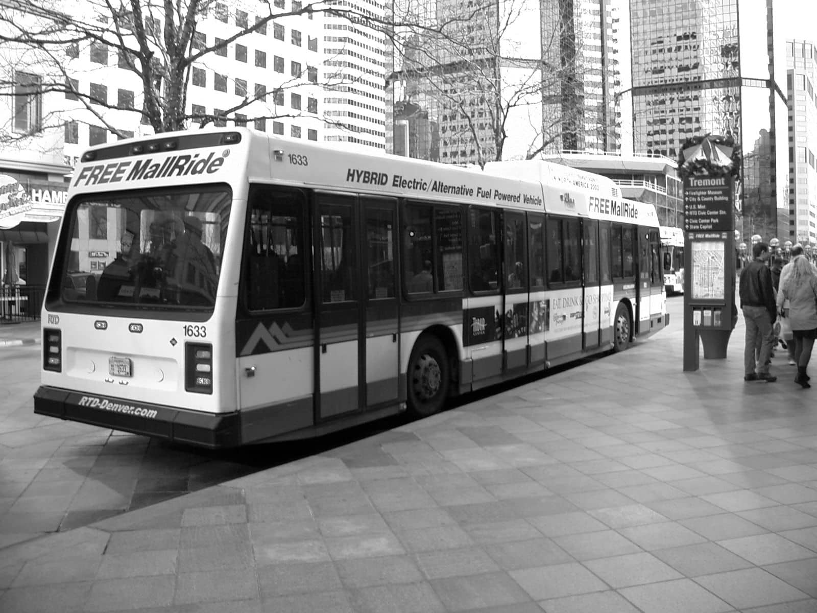 Black and white photo of the 16th Street Mall Bus at Tremont Stop in Denver