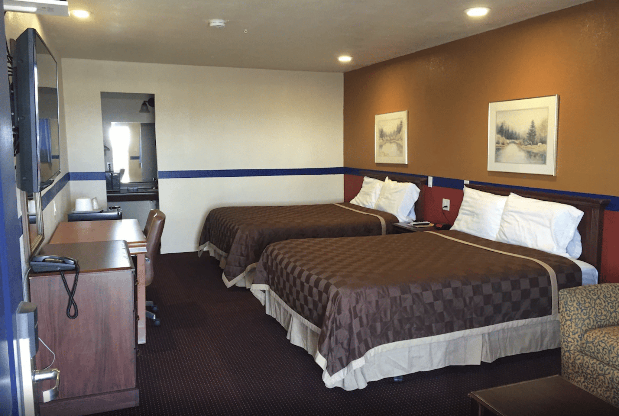 Inside of hotel room with two beds