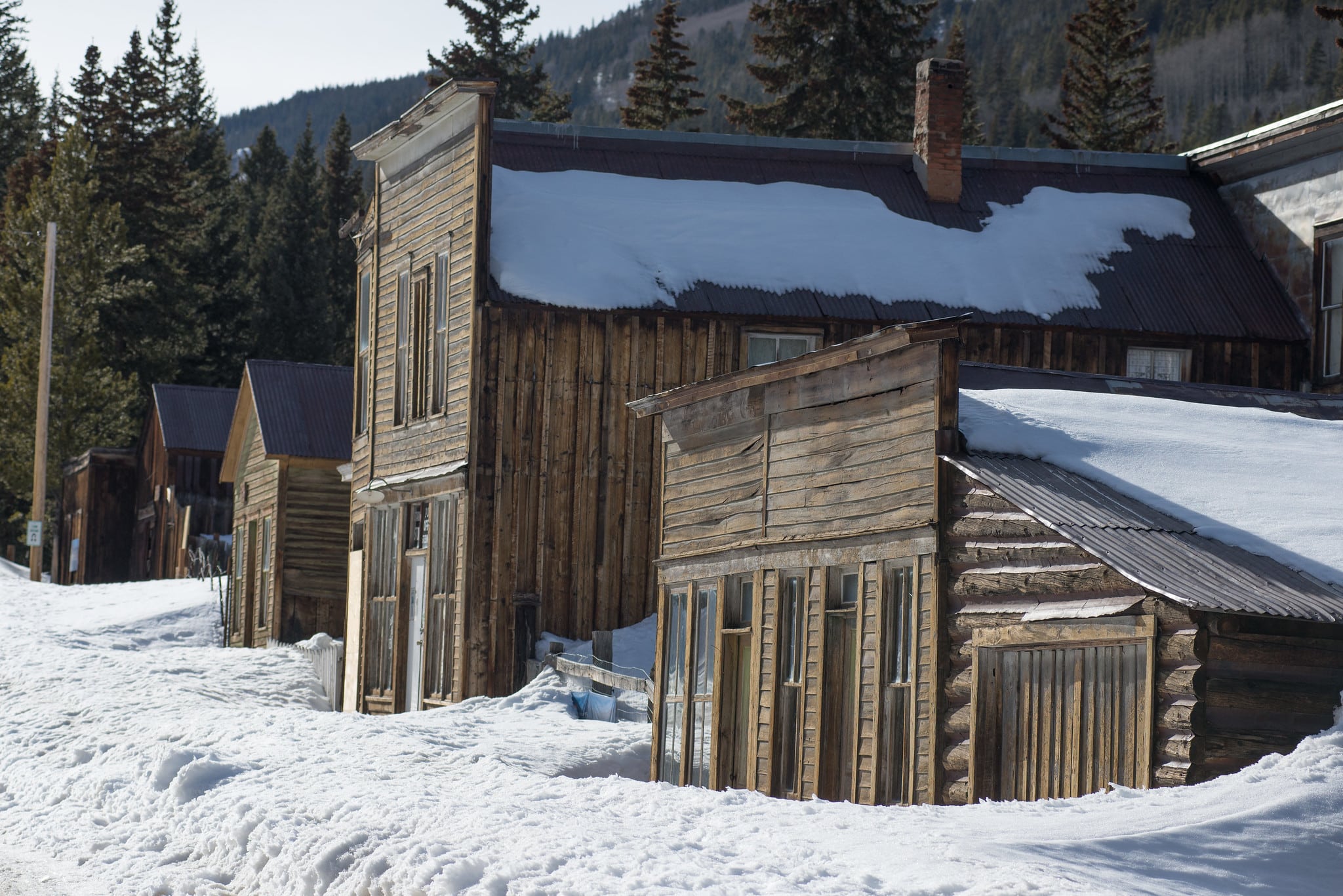 Ghost town buildings covered in snow