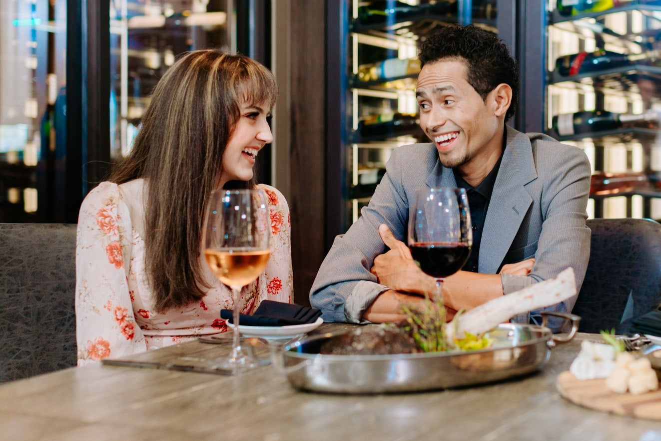 Female and male dine at Gaylord Rockies Resort & Convention Center - Aurora