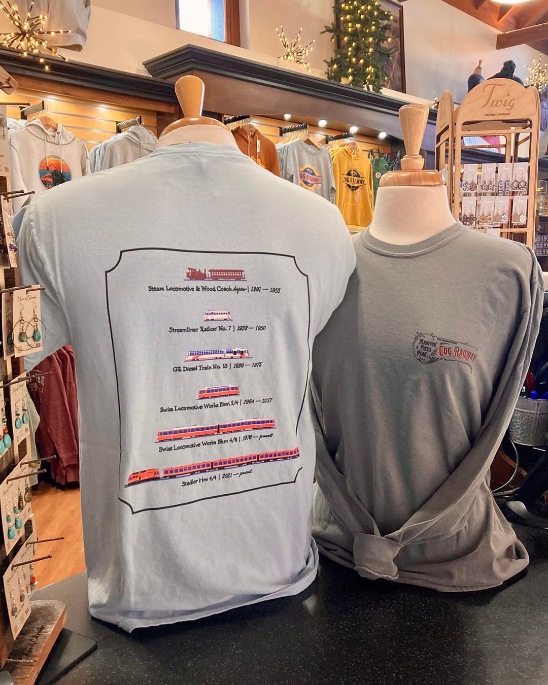 Two grey t-shirts on display