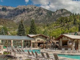 Outdoor pools at a hot springs resort on a sunny day