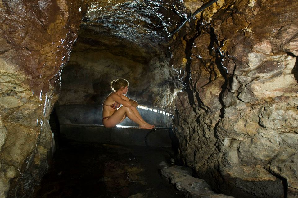 Vapor cave with woman sitting in it