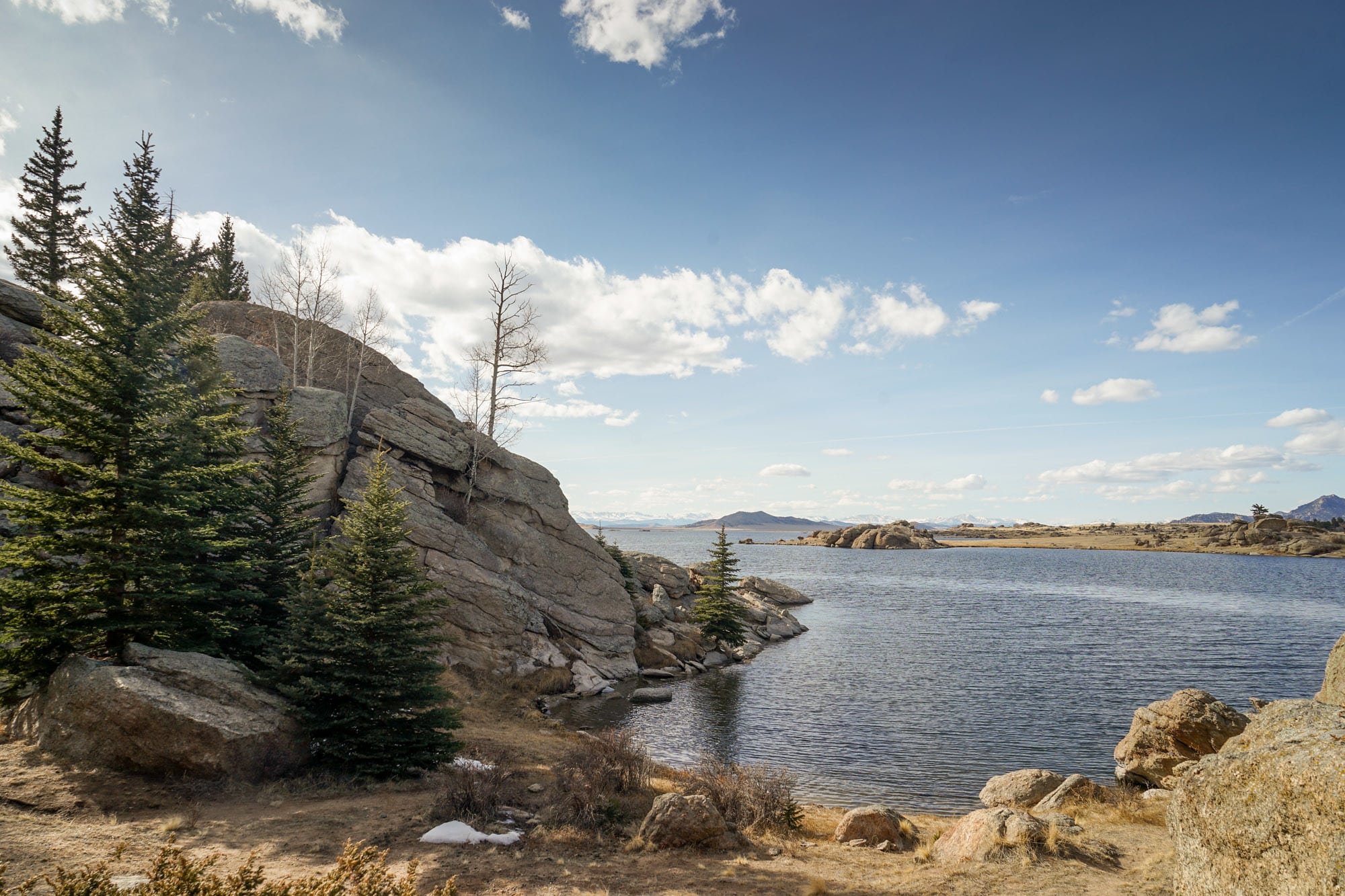 Rocky shoreline of a large reservoir