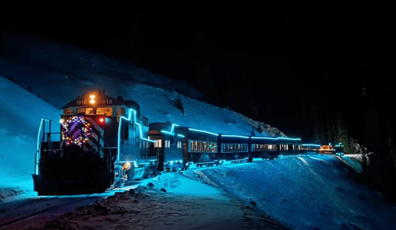 Lit up train at night