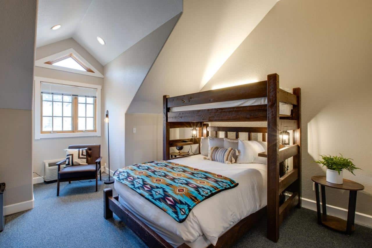 Private room with a full bed and top bunk twin bed at The Bivvi Hostel, Telluride, Colorado