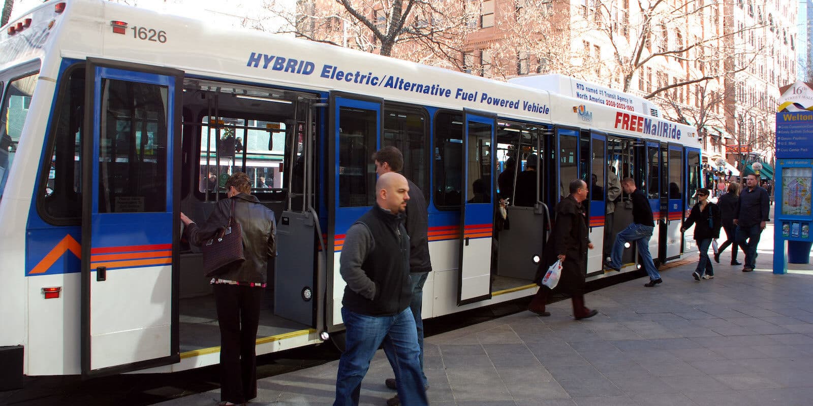 People depart from the Colorado Bus Ride on 16th Street Mall