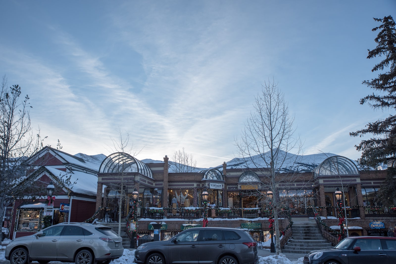 Shops in Downtown Breckenridge at dusk covered in snow