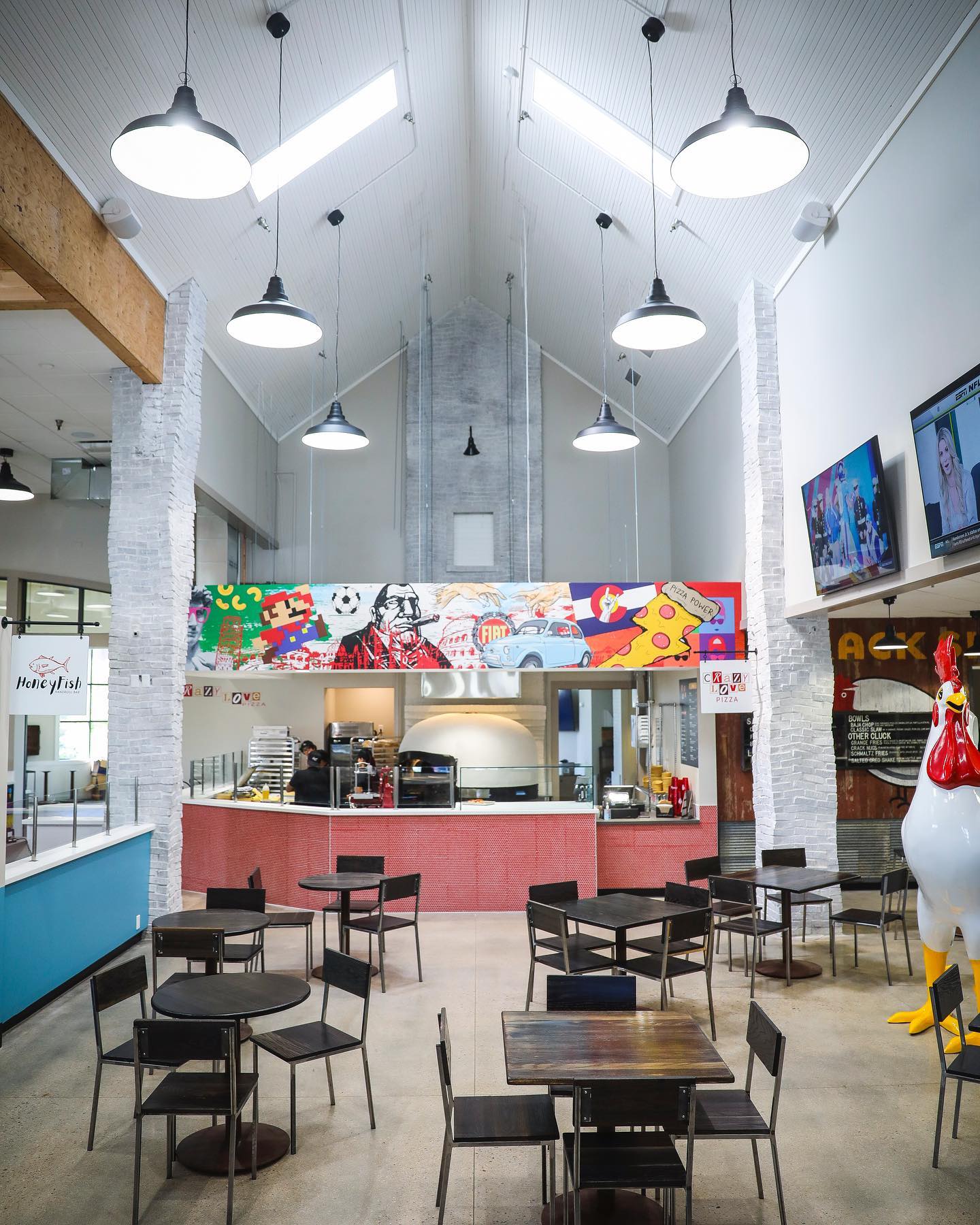 Inside of a food hall with multiple food stalls