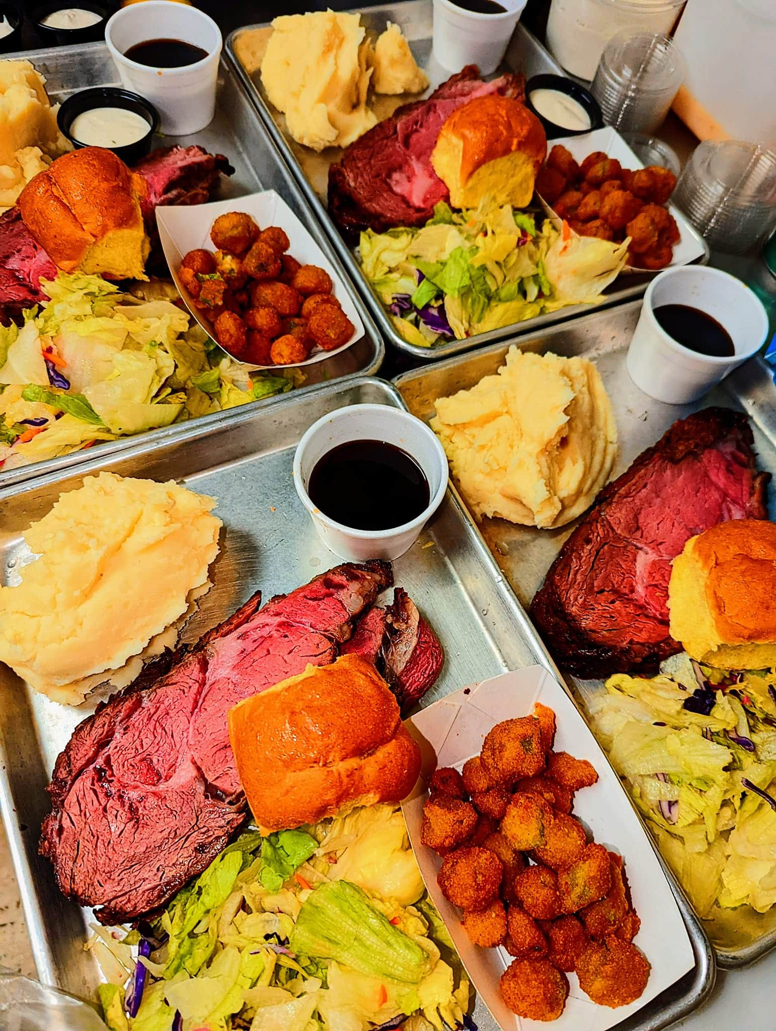 Platters of BBQ food