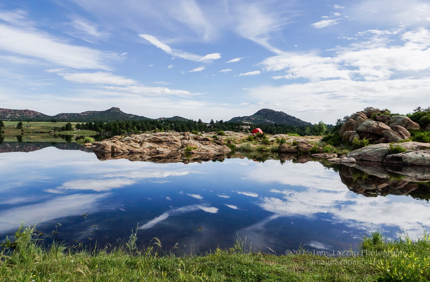 Blue lake reflecting sky