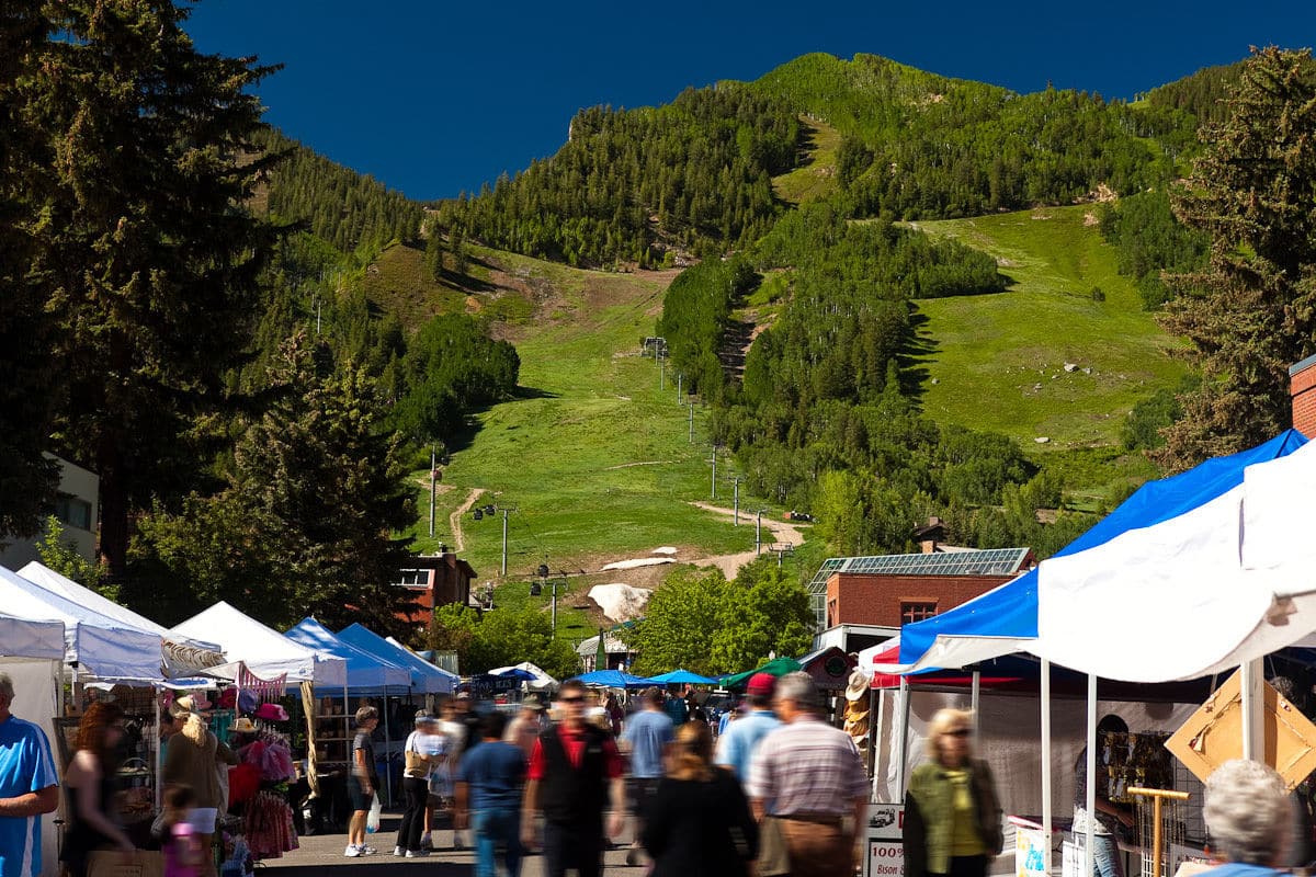 Crowds of people at a farmers market