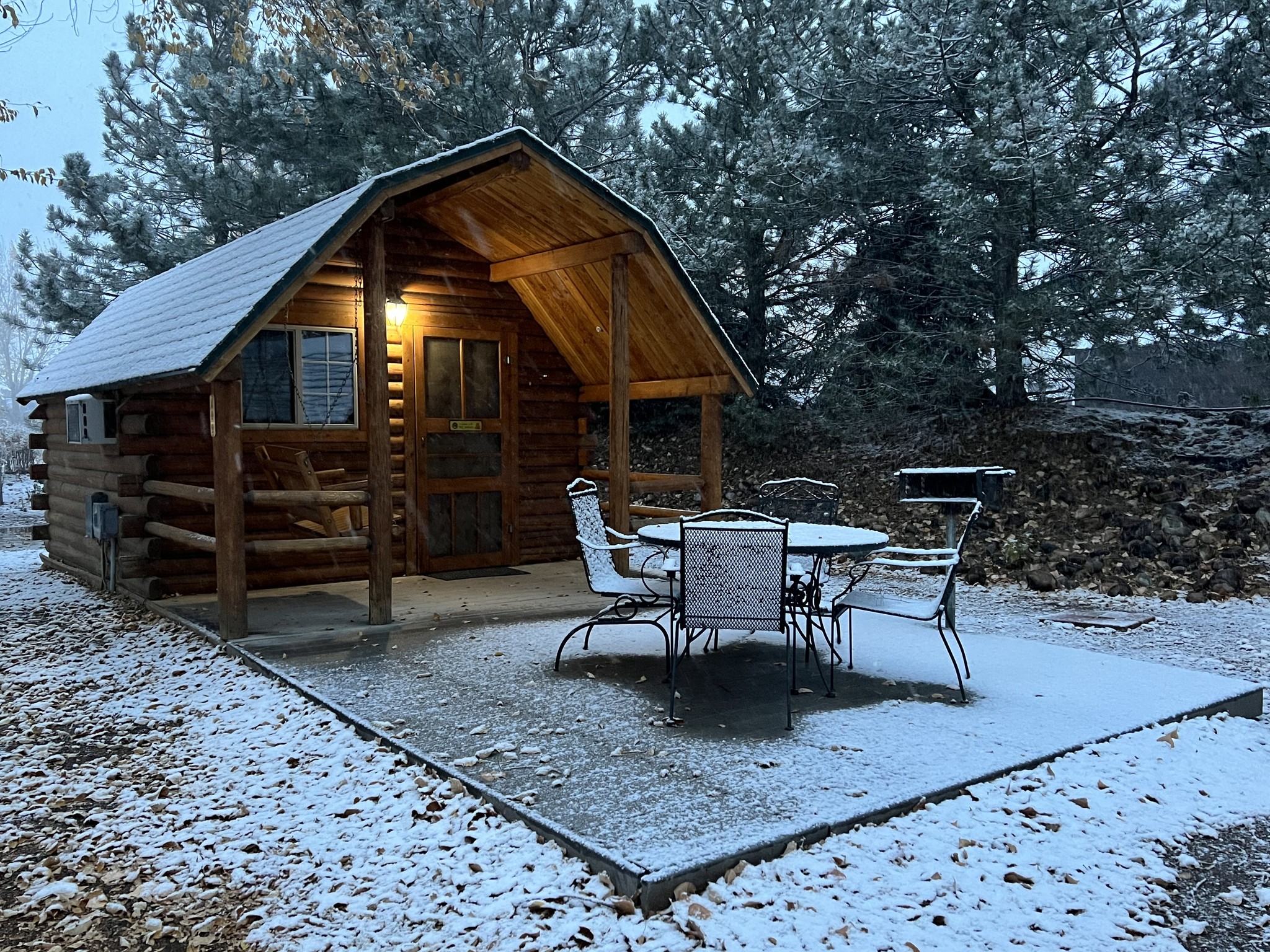 Cabin rental covered in a light dusting of snow at Fort Collins/Lakeside KOA