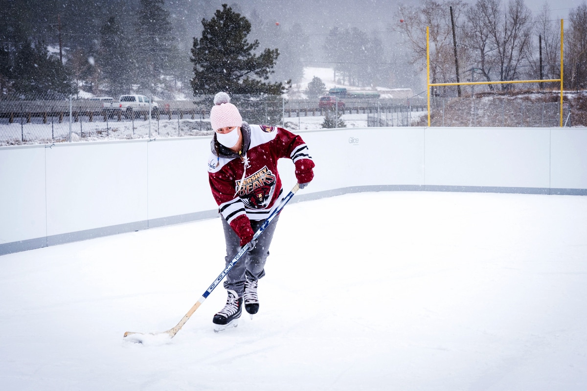 Boy in Hershey Bears jersey playing hockey at Frozen Fire Ice Rink