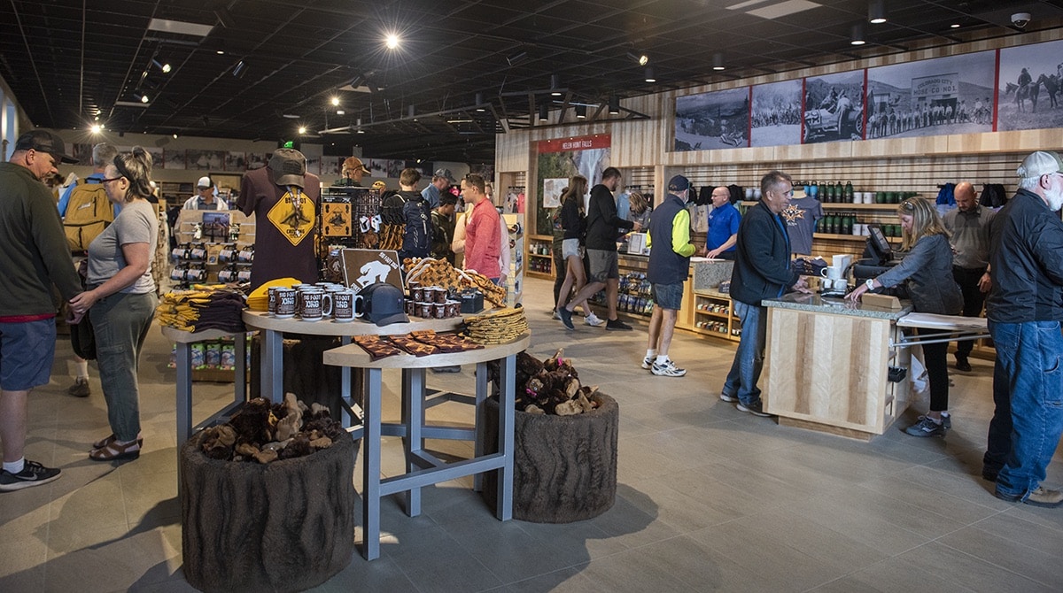 People perusing the gift shop inside the Pike Peak Summit Visitor Center