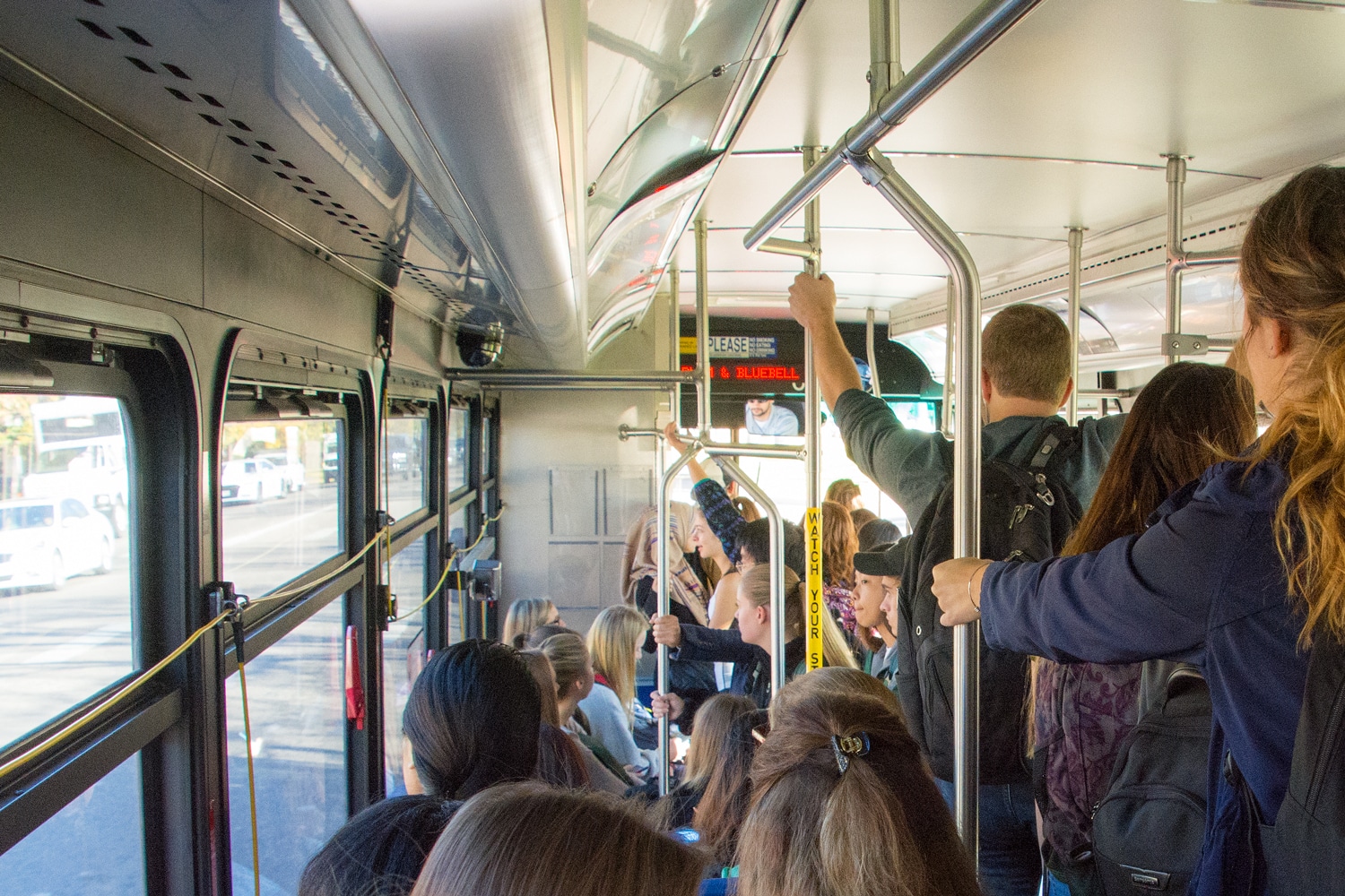 image of the inside of a Transfort bus with CSU student on-board in Fort Collins