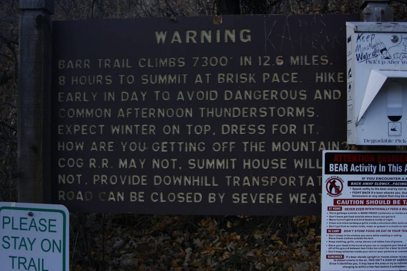 Some warning signs at the Barr Camp Trailhead going up Pikes Peak. Manitou Springs, Colorado