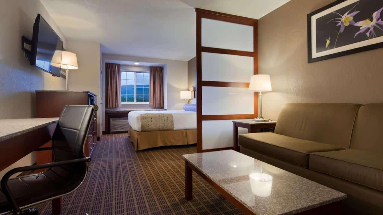 Hotel suite with living area at Best Western Plus Peak Vista Inn & Suites in Colorado Springs