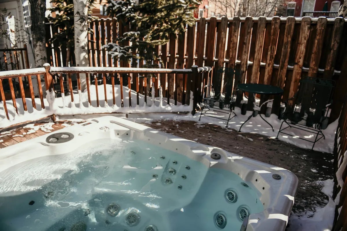 Outdoor hot tub spa at Clipper Inn B&B in Ouray, Colorado