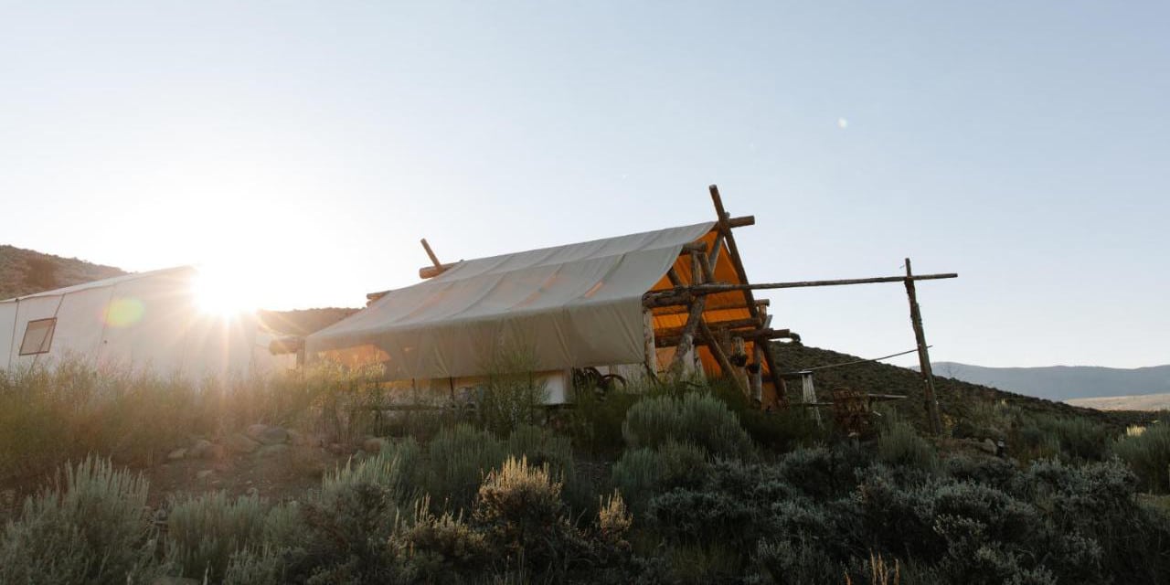 Sunrise over a glamping tent at Collective Vail Retreat in Colorado