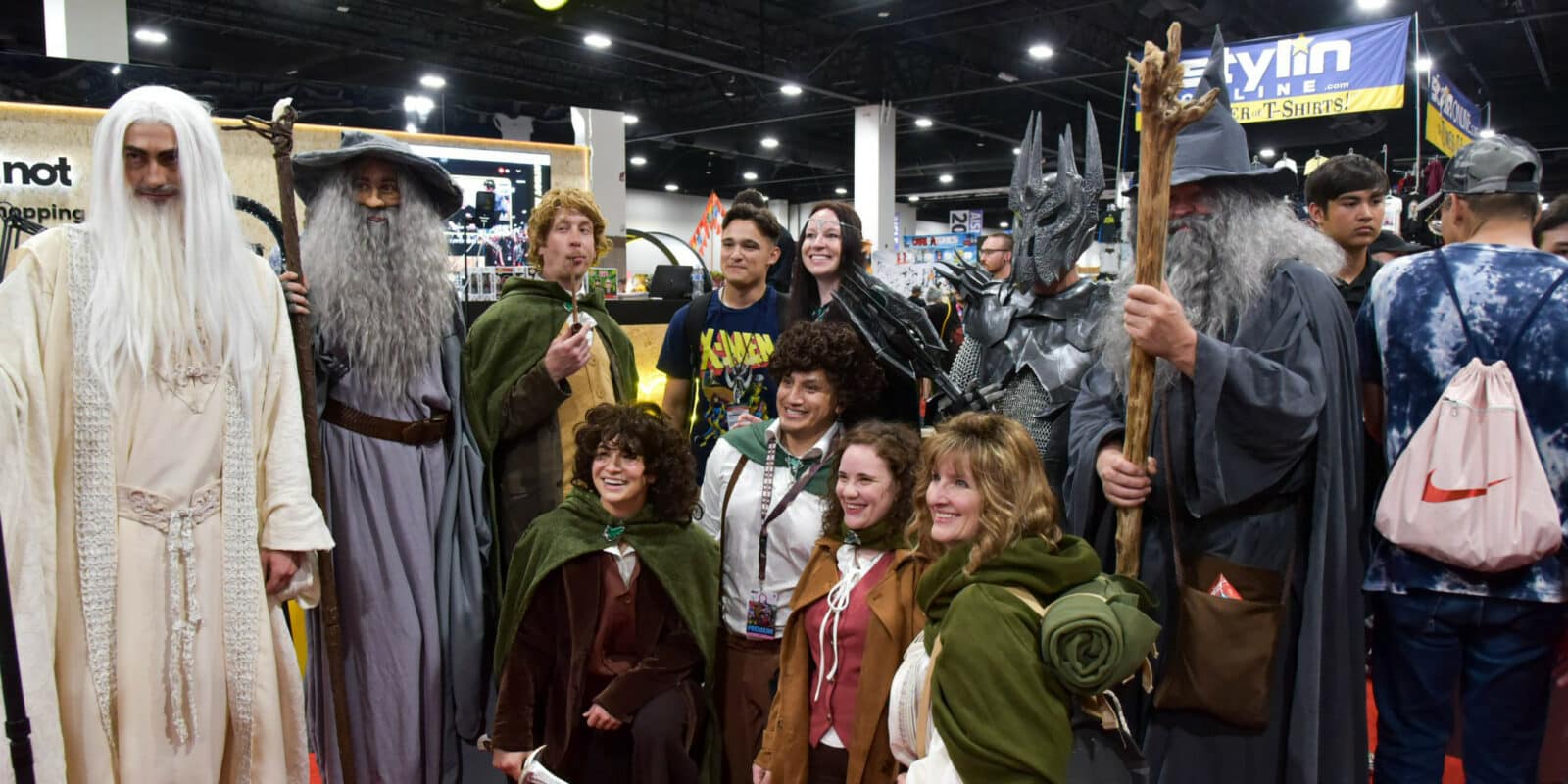 Group of people posing for a photo at FAN EXPO in Denver dressed up as their favorite characters