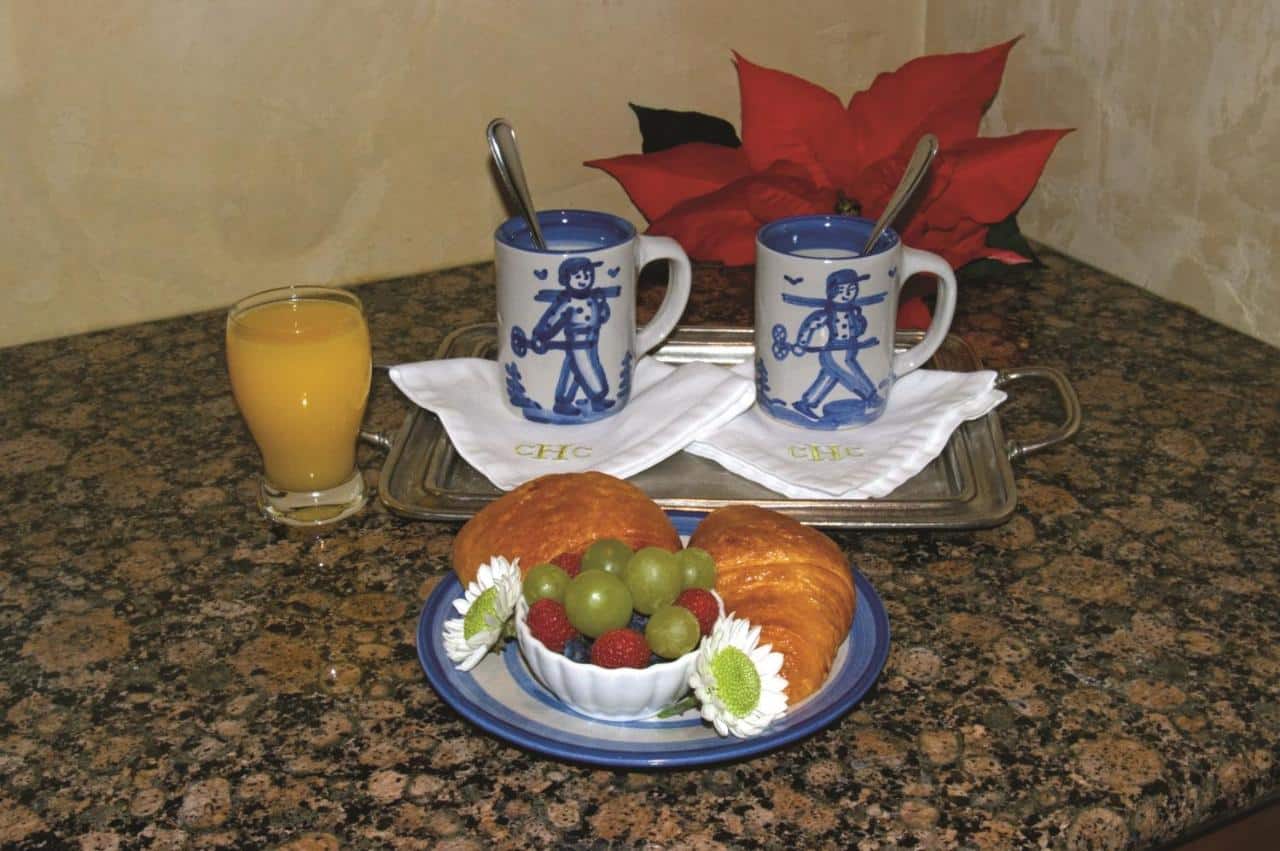 Croissants, fruit orange juice and coffee at Hotel Chateau Chamonix in Georgetown, Colorado