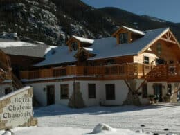 Snow on the roof and front exterior of the Hotel Chateau Chamonix in Georgetown, Colorado