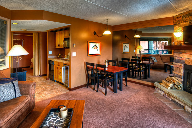 Sitting area in one of the suites at Beaver Run Resort. Small dining table and kitchenette