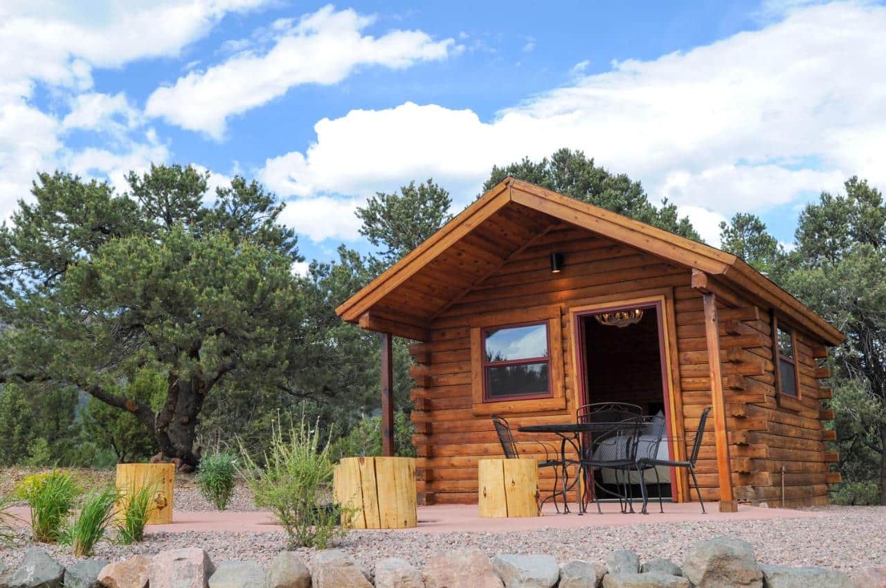 Log cabin during the daytime at Royal Gorge Cabins in Canon City, Colorado