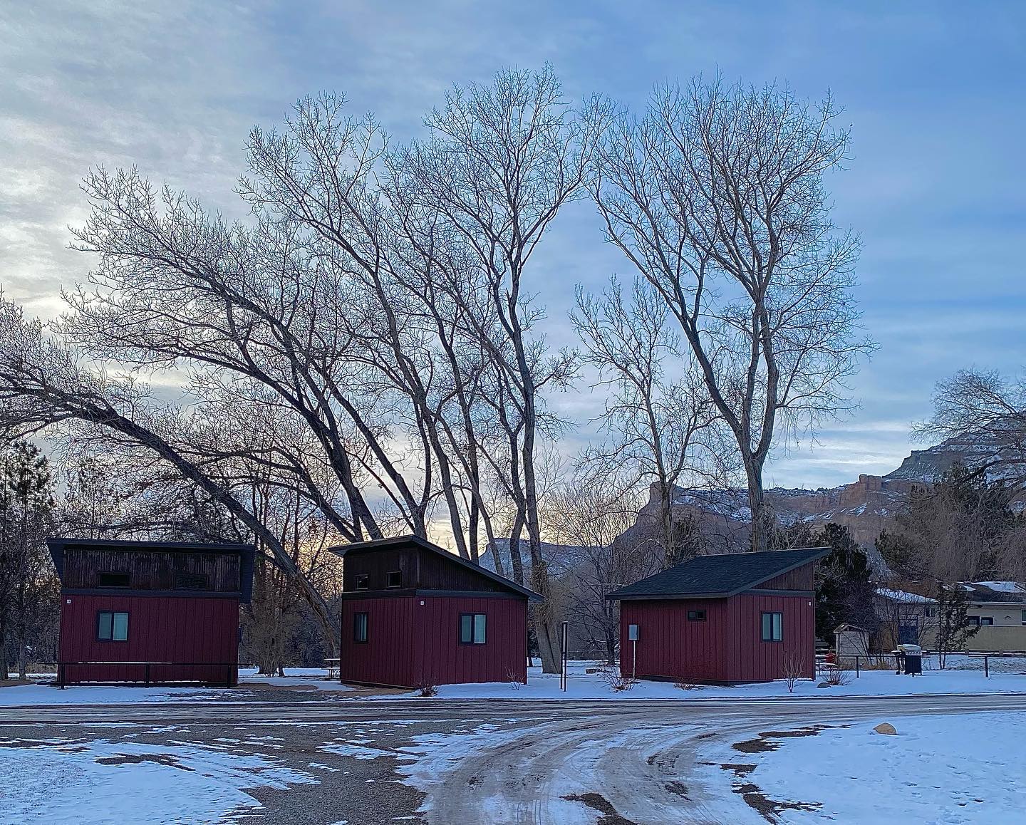 Cabin rentals in the winter with some snow at Palisade Basecamp in Western Colorado