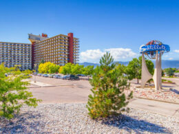 Hotel building on the left side and Satellite Hotel sign on the right