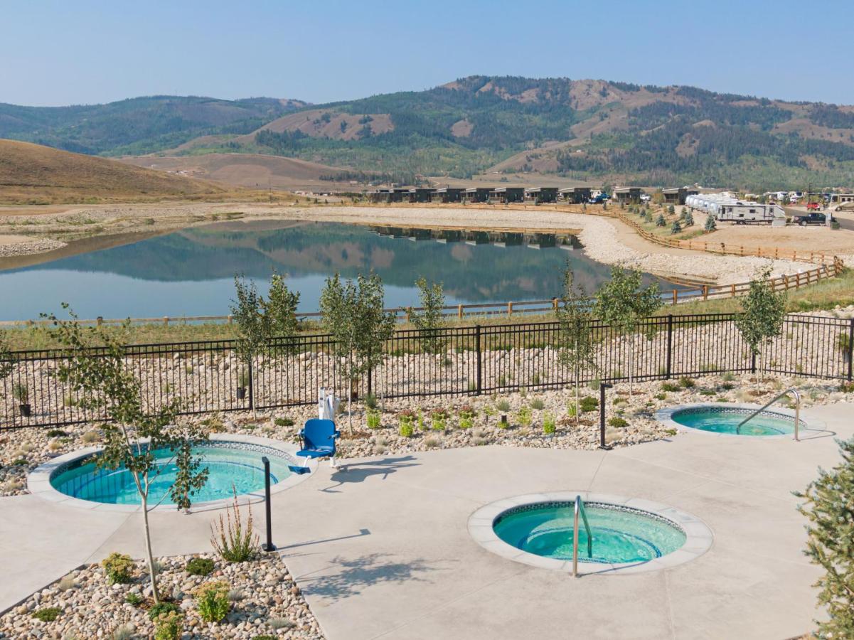Overlooking the hot tubs with campground in the background at Sun Outdoors Rocky Mountains