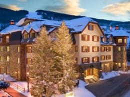 Snow on roof of front exterior of the Tivoli Lodge in Vail, Colorado