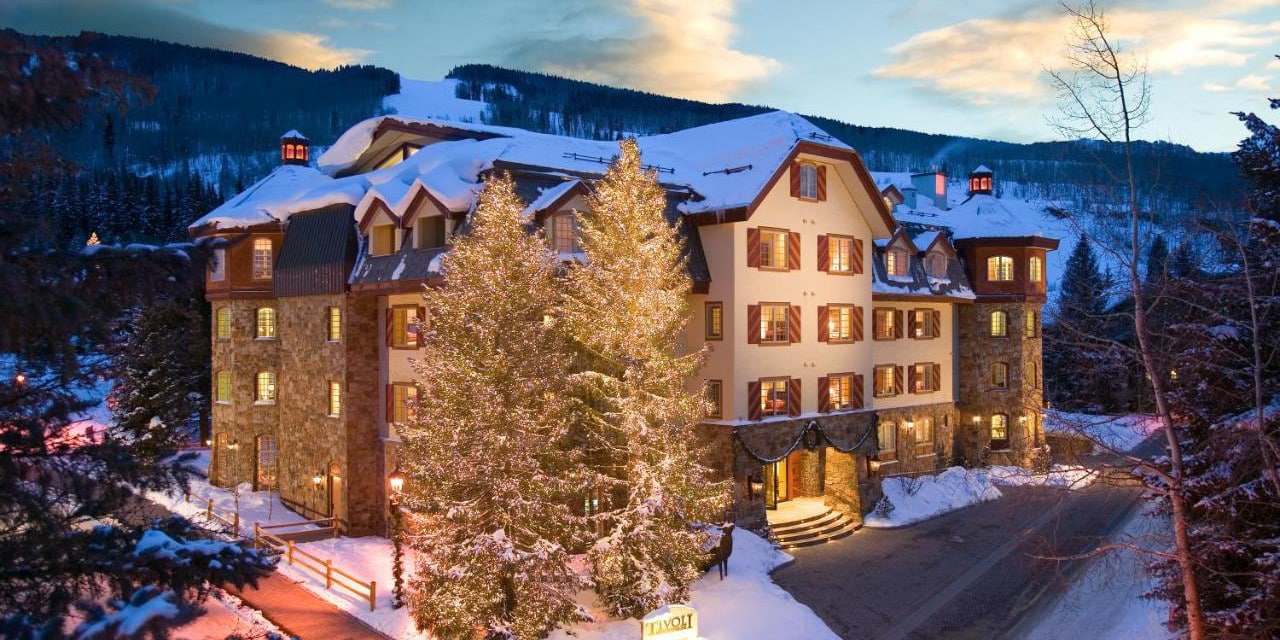 Snow on roof of front exterior of the Tivoli Lodge in Vail, Colorado