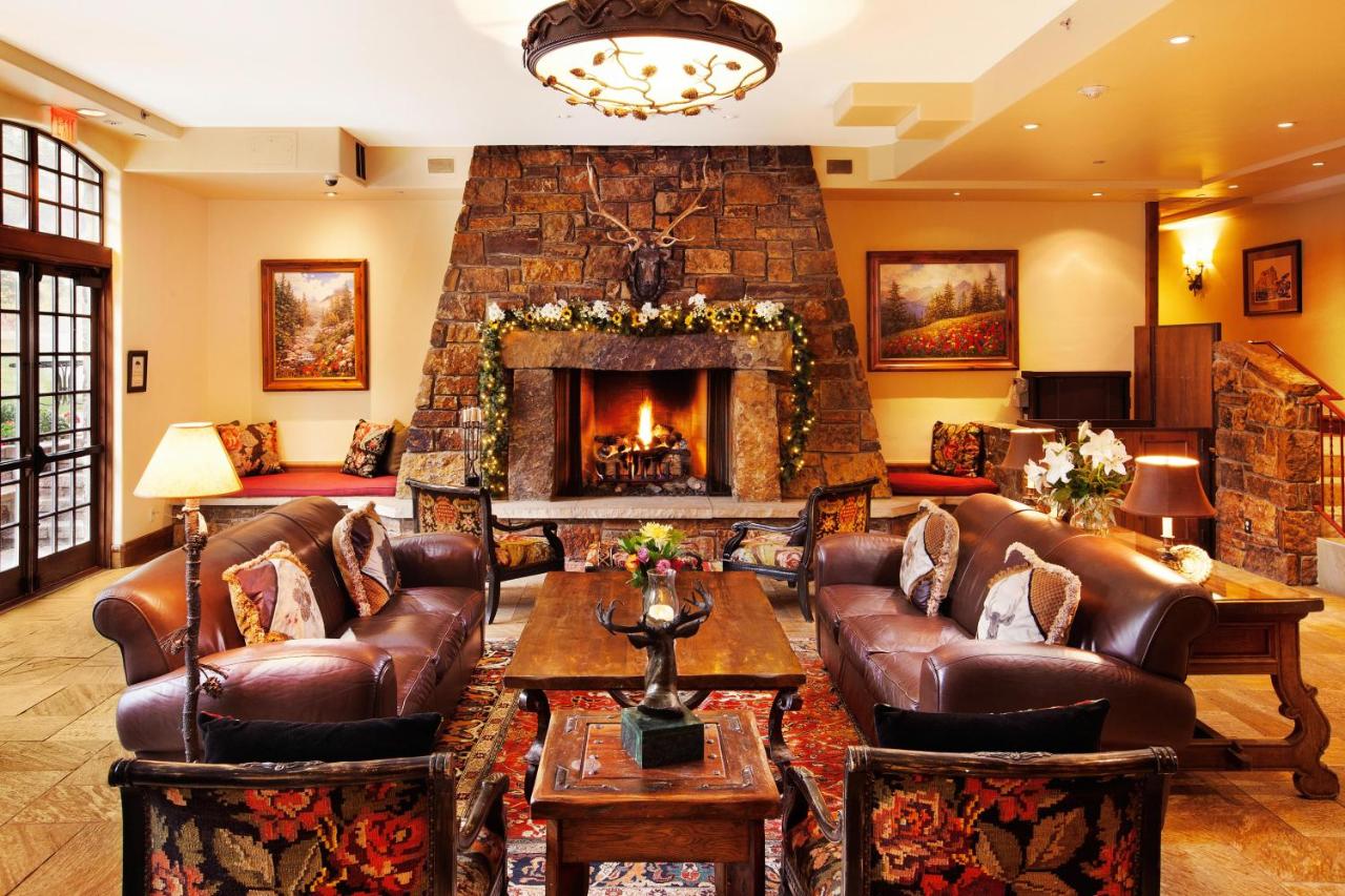 Stone fireplace int he lobby of the Tivoli Lodge in Vail, Colorado