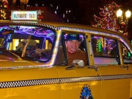 Yellow taxi cab with happy driver at the Ultimate Taxi in Aspen