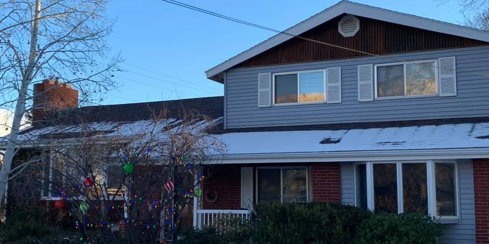 Exterior in winter with snow on the ground at Vistas & Vineyards BnB in Palisade, Colorado