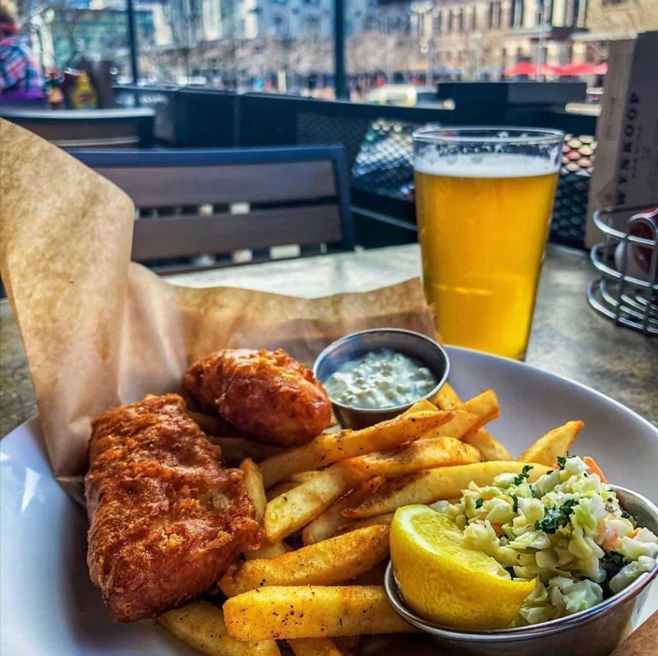 Fish and chips platter with a glass of beer at Wynkoop Brewing Co in Denver