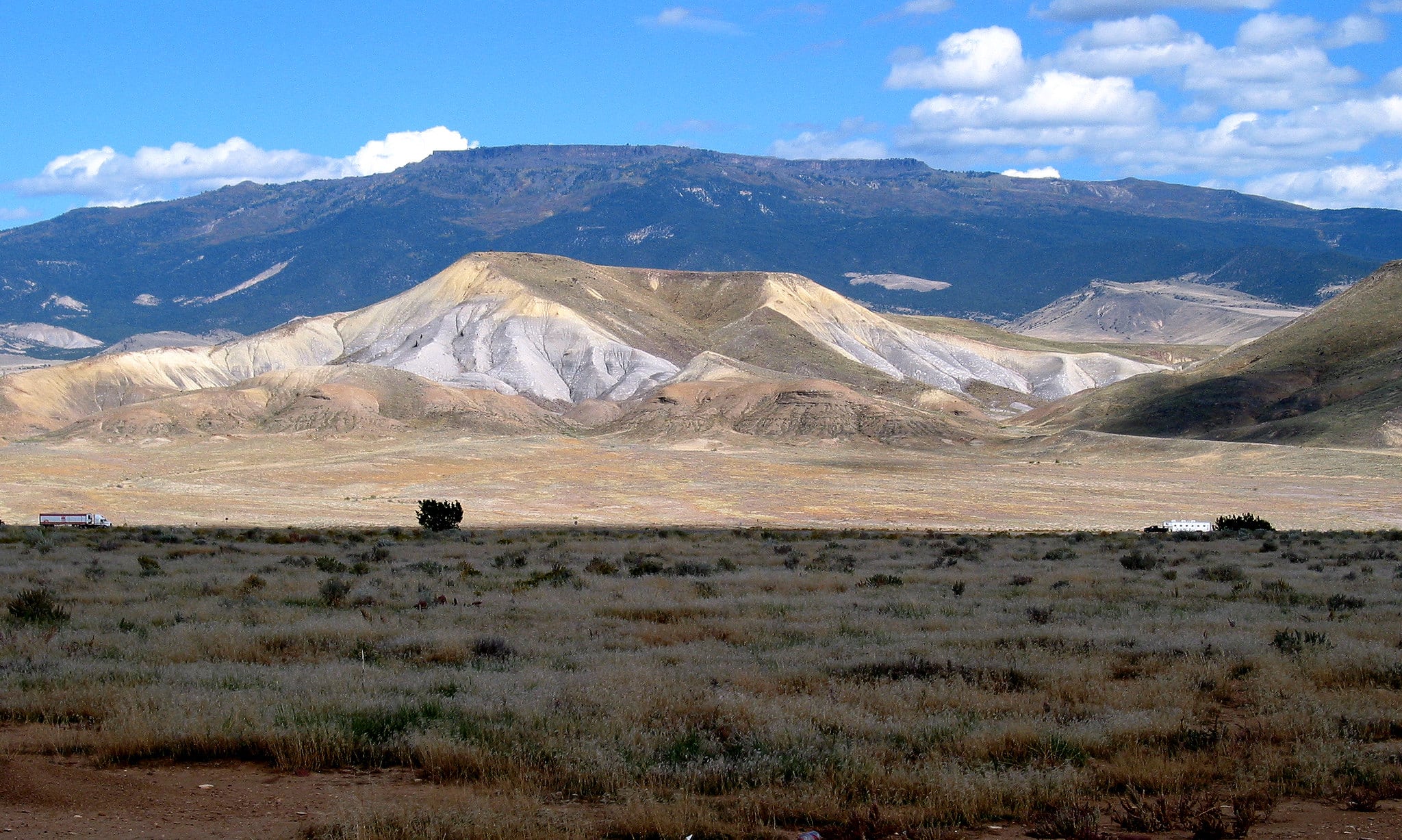 View of the largest flat-top mountain in the world, Grand Mesa in southwestern Colorado. The Grand Mesa Scenic Byway is a 63-mile route that ascends the mesa and offers great recreation opportunities