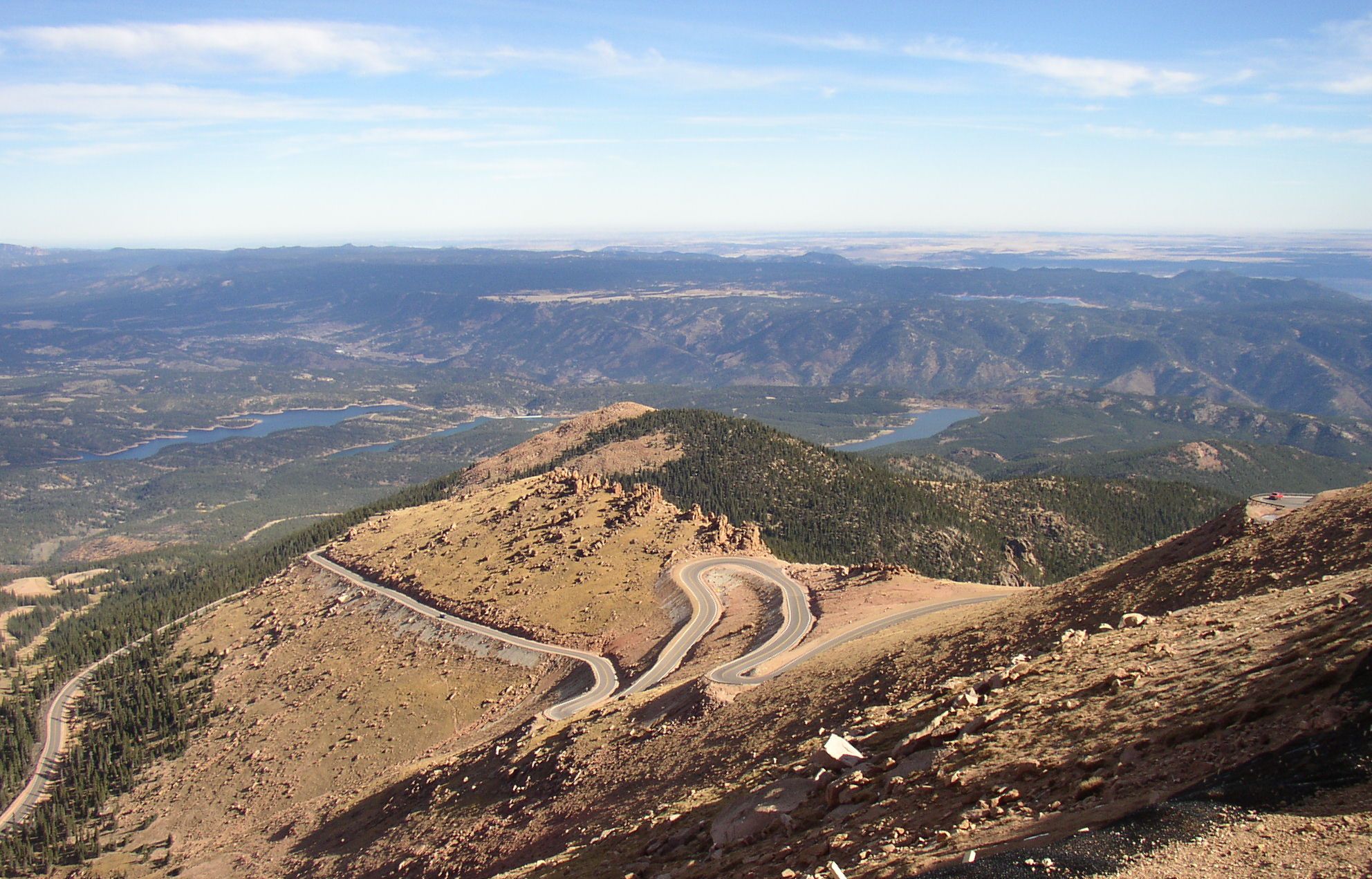 Looking down from the top at the switchbacks of the Pikes Peak Highway road along the side of the mountain