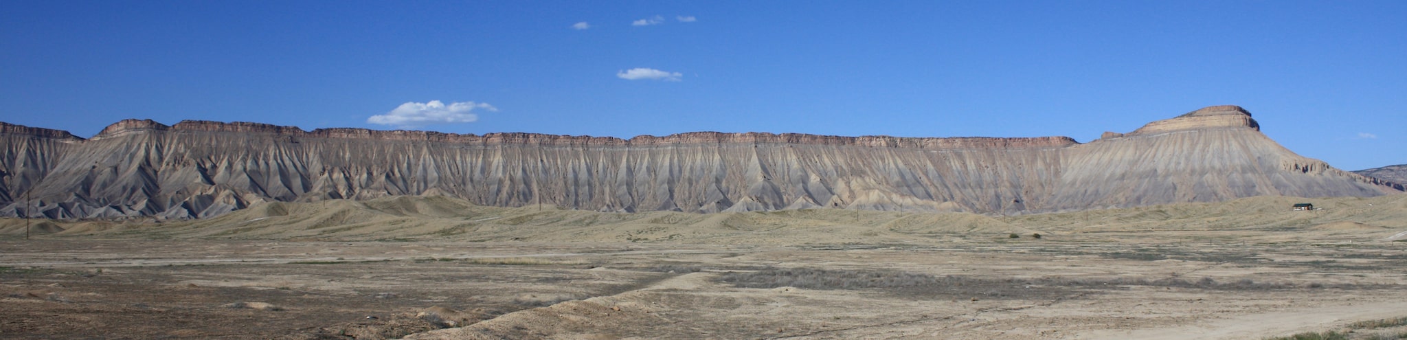 Panorama photo of the Book Cliff mountain range with Mount Garfield on the eastern side in Colorado