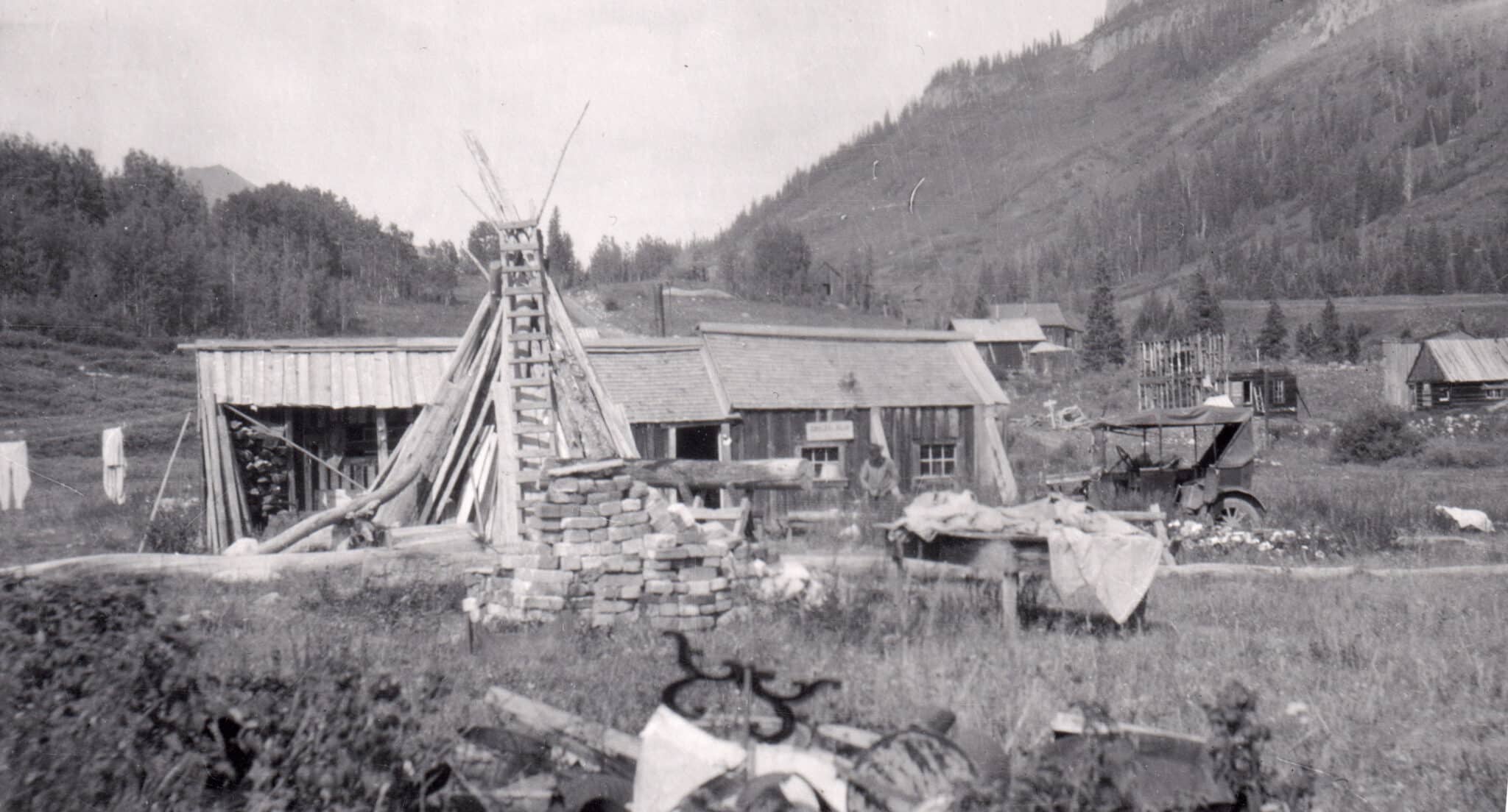 Teepee and home in Gothic, Colorado, circa 1913