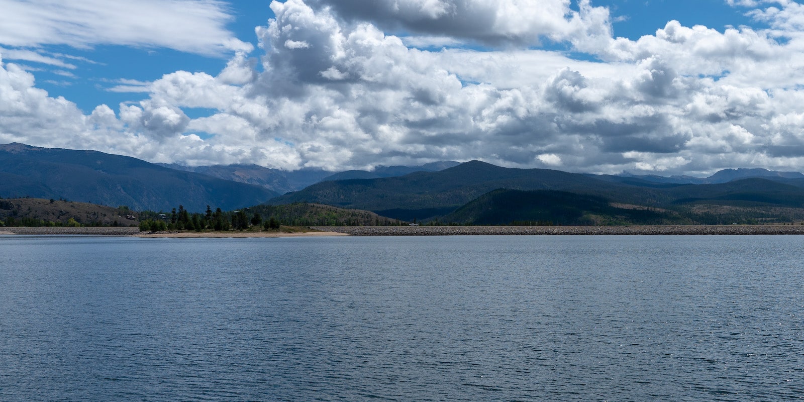 Cloudy blue sky over Lake Granby in Colorado