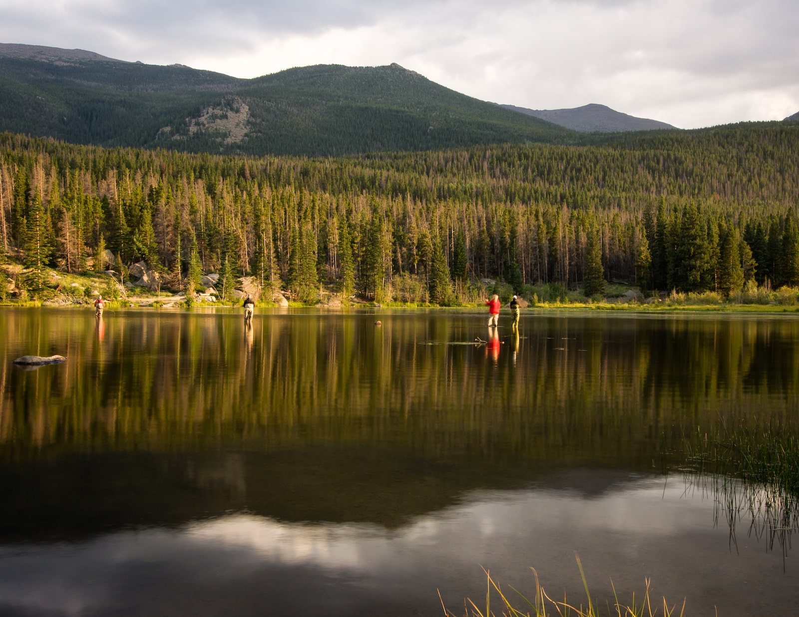 Fishermen out in the middle of Sprague Lake in Colorado