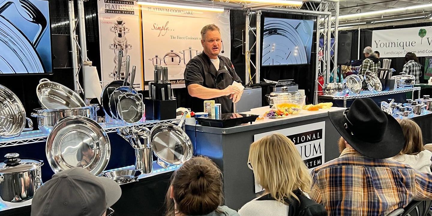 A speaker talks to a group about kitchenware at Denver Home Show