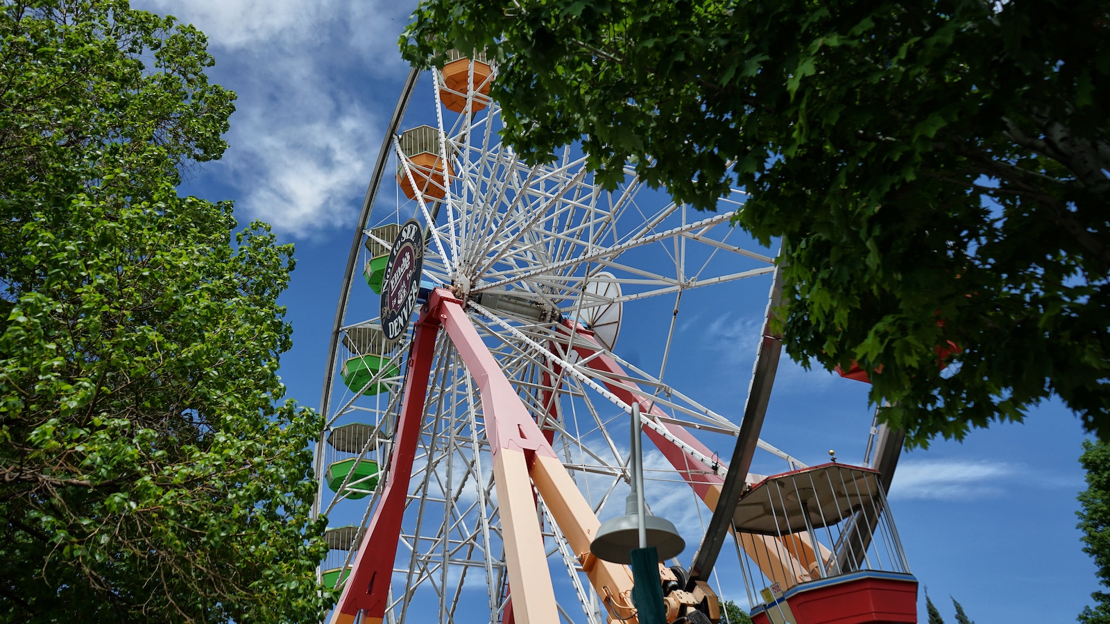 Looking up at a ferris wheel at Elitch Gardens Theme Park