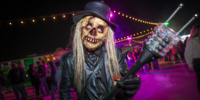 scary ghoul with guitar at 13th Floor Haunted House in Denver